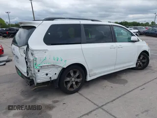 2011 Toyota Sienna SE with VIN 5TDXK3DC1BS069696, listed as a IAAI auction lot 41976857 with 160,994 mi miles. Bid and sale history available at carsss.com. Image 4.