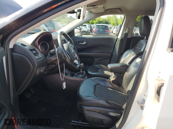 2019 Jeep Compass Trailhawk with VIN 3C4NJDDBXKT671249, listed as a Copart auction lot 58927225 with Not provided miles and Salvage title. Bid and sale history available at DreamBid. Image 7.