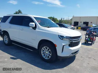 2023 Chevrolet Tahoe LT with VIN 1GNSCNKD2PR295967, listed as a IAAI auction lot 41859502 with 47,476 mi miles. Bid and sale history available at carsss.com. Image 1.