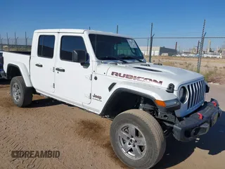 2020 Jeep Gladiator Rubicon with VIN 1C6JJTBG6LL187235, listed as a IAAI auction lot 42010374 with Not Provided miles and . Bid and sale history available at DreamBid. Image 1.