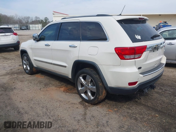 2012 Jeep Grand Cherokee Overland with VIN 1C4RJECT5CC362349, listed as a IAAI auction lot 41760221 with 218,350 mi miles. Bid and sale history available at carsss.com. Image 3.