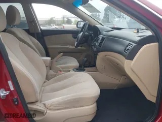 2009 Kia Optima LX with VIN KNAGE228095312766, listed as a IAAI auction lot 42074522 with 183,240 mi miles. Bid and sale history available at carsss.com. Image 5.
