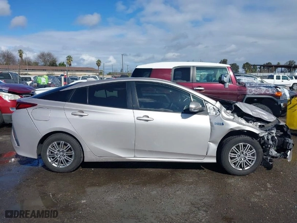 2021 Toyota Prius Prime LE with VIN JTDKAMFP2M3182760, listed as a IAAI auction lot 41593981 with NaN miles. Bid and sale history available at carsss.com. Image 14.