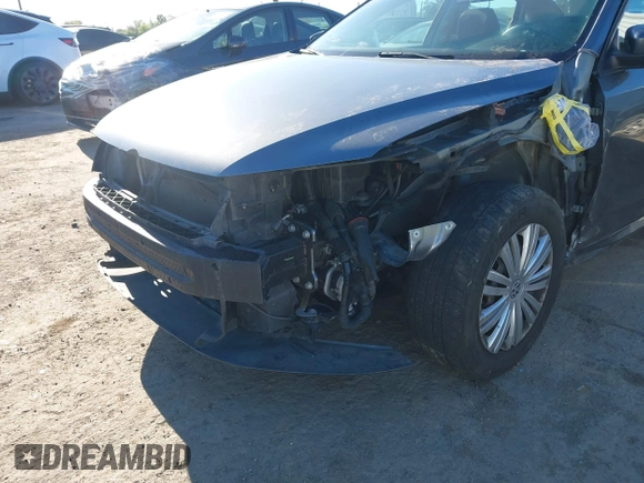 2015 Volkswagen Passat 1.8T Wolfsburg Ed with VIN 1VWAT7A3XFC010262, listed as a IAAI auction lot 41860210 with 99,775 mi miles. Bid and sale history available at carsss.com. Image 6.