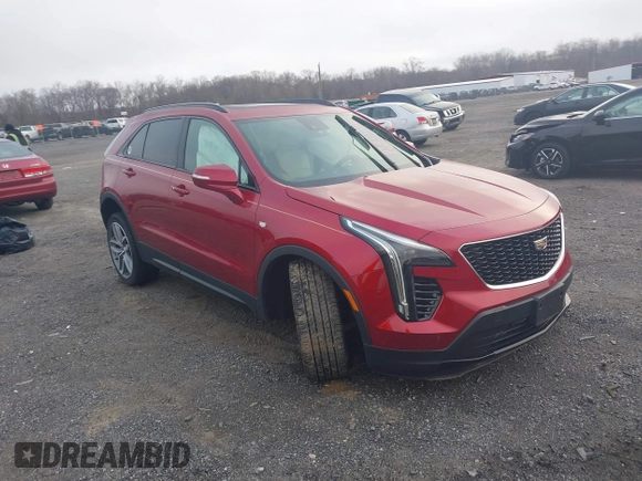 2021 Cadillac XT4 AWD Sport with VIN 1GYFZFR43MF006039, listed as a IAAI auction lot 41845105 with 19,289 mi miles and . Bid and sale history available at DreamBid. Image 1.