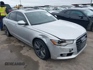 2015 Audi A6 2.0T Premium Plus with VIN WAUGFAFC8FN032627, listed as a IAAI auction lot 41270302 with 82,104 mi miles. Bid and sale history available at carsss.com. Image 1.