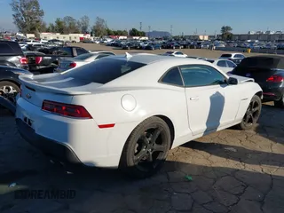2014 Chevrolet Camaro LT z VIN 2G1FC1E39E9321549, wystawiony jako IAAI lot #41582840 z przebiegiem 129 495 mil mil oraz . Historia ofert i sprzedaży dostępna na DreamBid. Obrazek 4.