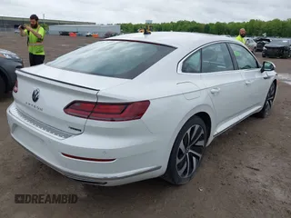 2021 Volkswagen Arteon SEL R-Line z VIN WVWSR7AN6ME007156, wystawiony jako IAAI lot #42254735 z przebiegiem 32 004 mil mil oraz . Historia ofert i sprzedaży dostępna na DreamBid. Obrazek 4.