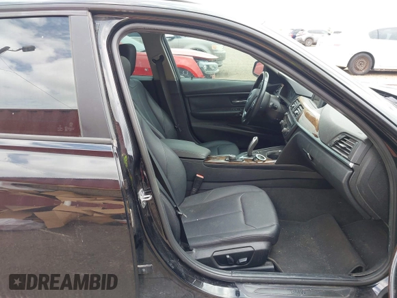 2015 BMW 3 Series 328i with VIN WBA3C1C5XFP852807, listed as a IAAI auction lot 42043565 with 120,048 mi miles and . Bid and sale history available at carsss.com. Image 5.