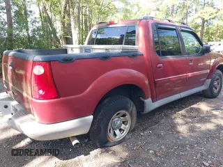 2001 Ford Explorer Sport Trac z VIN 1FMZU67EX1UA94698, wystawiony jako IAAI lot #42764474 z przebiegiem 299 653 mil mil oraz . Historia ofert i sprzedaży dostępna na DreamBid. Obrazek 6.