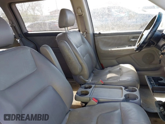 2001 Honda Odyssey EX z VIN 2HKRL18661H597205, wystawiony jako IAAI lot #41838509 z przebiegiem 317 084 mil mil oraz . Historia ofert i sprzedaży dostępna na DreamBid. Obrazek 5.