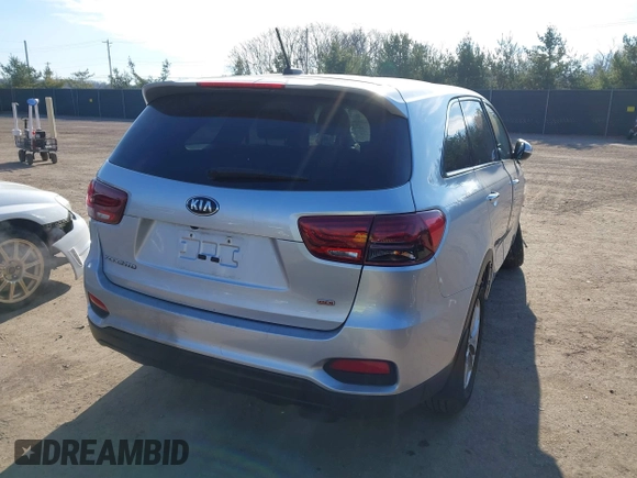 2020 Kia Sorento LX with VIN 5XYPG4A31LG638850, listed as a IAAI auction lot 40982683 with 143,149 mi miles. Bid and sale history available at carsss.com. Image 4.