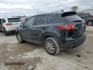 2016 Mazda CX-5 Touring z VIN JM3KE2CY0G0846699, wystawiony jako Copart lot #81785864 z przebiegiem 140 750 mil mil oraz Szkoda całkowita • Salvage title. Historia ofert i sprzedaży dostępna na DreamBid. Obrazek 2.