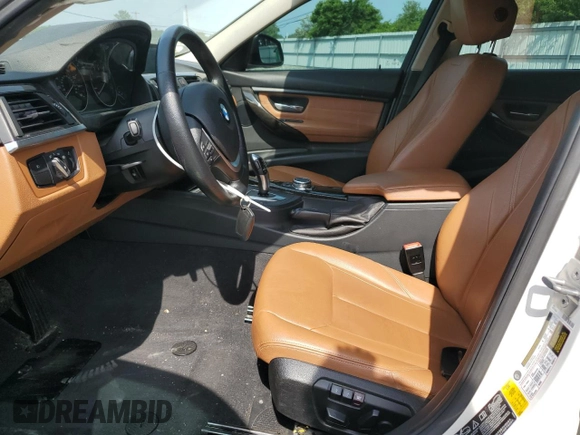 2015 BMW 3 Series 328i xDrive with VIN WBA3B3G52FNT19323, listed as a Copart auction lot 61873015 with 110,893 mi miles and Salvage title. Bid and sale history available at DreamBid. Image 7.