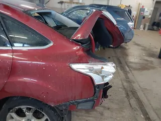 2012 Ford Focus SEL with VIN 1FAHP3H26CL400160, listed as a IAAI auction lot 41374041 with 187,221 mi miles. Bid and sale history available at carsss.com. Image 6.