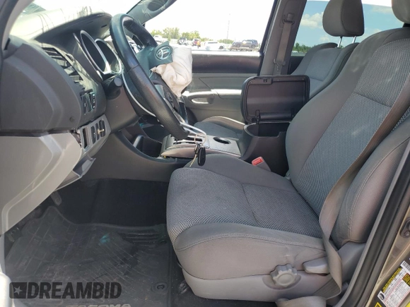 2014 Toyota Tacoma PreRunner with VIN 3TMJU4GN2EM165750, listed as a Copart auction lot 56969605 with Not Provided miles and Clean Title. Bid and sale history available at DreamBid. Image 7.