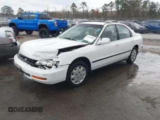1996 Honda Accord LX with VIN 1HGCD5633TA266516, listed as a IAAI auction lot 41839684 with 162,523 mi miles and . Bid and sale history available at carsss.com. Image 2.