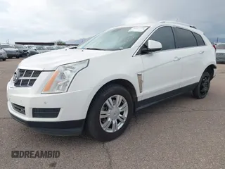 2012 Cadillac SRX Luxury Collection z VIN 3GYFNAE32CS518428, wystawiony jako IAAI lot #42153391 z przebiegiem 159 836 mil mil oraz . Historia ofert i sprzedaży dostępna na DreamBid. Obrazek 2.