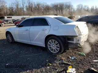 2014 Chrysler 300 C with VIN 2C3CCAKG7EH379106, listed as a Copart auction lot 83664344 with 132,536 mi miles and Salvage Title. Bid and sale history available at carsss.com. Image 2.