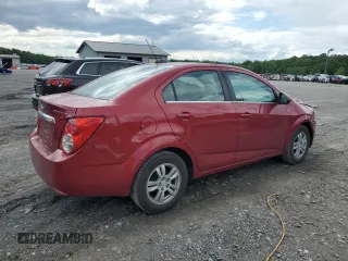 2016 Chevrolet Sonic LT z VIN 1G1JC5SG4G4175558, wystawiony jako Copart lot #57991275 z przebiegiem 133 497 mil mil oraz Szkoda całkowita • Salvage title. Historia ofert i sprzedaży dostępna na DreamBid. Obrazek 3.