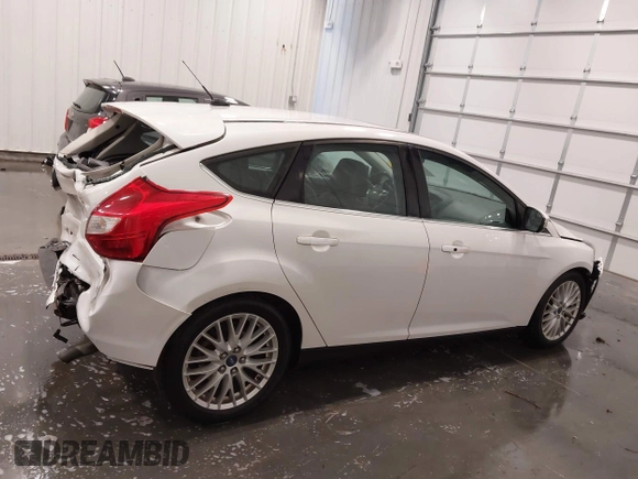 2014 Ford Focus Titanium with VIN 1FADP3N27EL110287, listed as a IAAI auction lot 42210697 with 107,741 mi miles and . Bid and sale history available at DreamBid. Image 13.