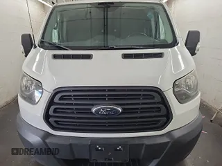 2018 Ford Transit with VIN 1FTYR1YG2JKB43974, listed as a IAAI auction lot 41852638 with 104,713 mi miles and . Bid and sale history available at DreamBid. Image 7.