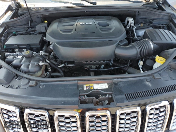 2018 Jeep Grand Cherokee Overland with VIN 1C4RJFCG2JC212947, listed as a Copart auction lot 59503405 with 76,436 mi miles and Clean title. Bid and sale history available at DreamBid. Image 12.