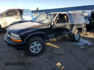2000 Chevrolet Blazer LS z VIN 1GNCT18W7YK143649, wystawiony jako Copart lot #87656195 z przebiegiem Nie podano mil oraz Czysty tytuł • Clean title. Historia ofert i sprzedaży dostępna na DreamBid. Obrazek 1.
