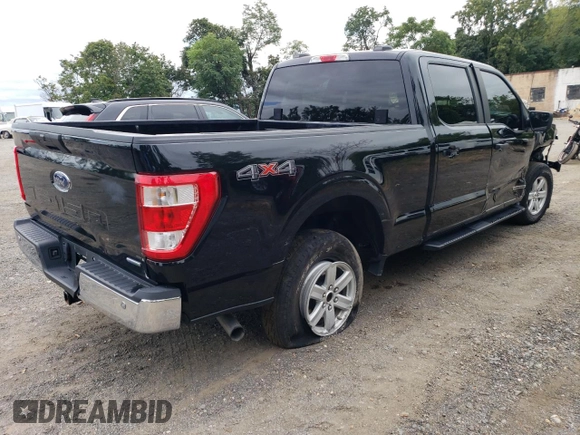 2021 Ford F-150 XL with VIN 1FTFW1ED0MFB39526, listed as a Copart auction lot 70290404 with 65,581 mi miles and Salvage Title. Bid and sale history available at carsss.com. Image 3.