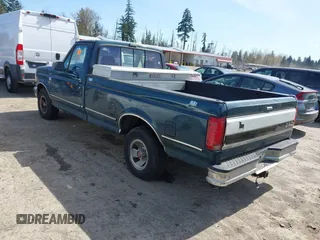 1992 Ford F-150 with VIN 1FTDF15Y1NPA17490, listed as a IAAI auction lot 41970697 with 171,419 mi miles. Bid and sale history available at carsss.com. Image 3.