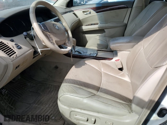 2009 Toyota Avalon XL with VIN 4T1BK36B19U339669, listed as a Copart auction lot 48547195 with 243,217 mi miles and Salvage Title. Bid and sale history available at carsss.com. Image 7.