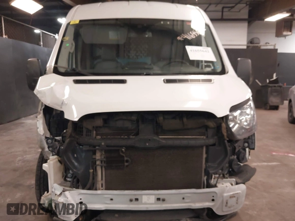 2016 Ford Transit Cargo with VIN 1FTYE1CM0GKA13242, listed as a IAAI auction lot 41655642 with 107,589 mi miles and . Bid and sale history available at carsss.com. Image 13.