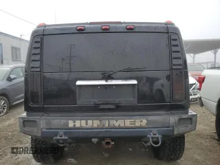 2003 Hummer H2 with VIN 5GRGN23U83H143843, listed as a Copart auction lot 43792915 with 115,569 mi miles and Salvage Title. Bid and sale history available at carsss.com. Image 6.