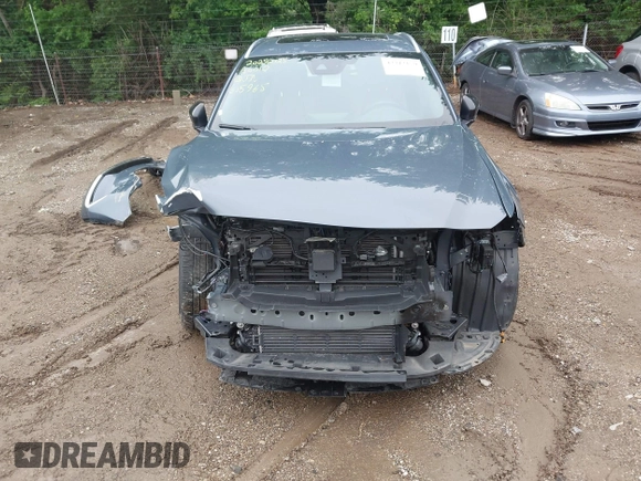 2022 Mazda CX-9 Grand Touring with VIN JM3TCBDY0N0615968, listed as a IAAI auction lot 42312159 with 22,912 mi miles and . Bid and sale history available at DreamBid. Image 12.