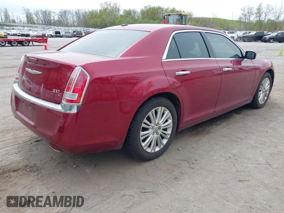 2012 Chrysler 300 C with VIN 2C3CCAKTXCH220185, listed as a IAAI auction lot 42110327 with 57,682 mi miles and . Bid and sale history available at DreamBid. Image 4.