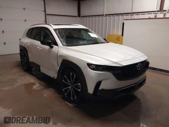 2023 Mazda CX-50 S Premium Plus with VIN 7MMVABEMXPN139186, listed as a IAAI auction lot 41289690 with 26,556 mi miles and . Bid and sale history available at DreamBid. Image 1.