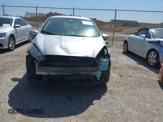 2019 Ford Fiesta SE with VIN 3FADP4EJ0KM148614, listed as a IAAI auction lot 41860070 with 68,361 mi miles and . Bid and sale history available at DreamBid. Image 6.