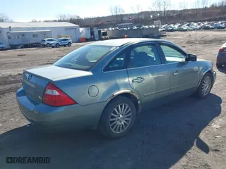 2005 Mercury Montego Premier with VIN 1MEFM42165G618285, listed as a IAAI auction lot 41595913 with 127,811 mi miles. Bid and sale history available at carsss.com. Image 4.