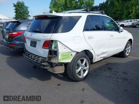 2017 Mercedes-Benz GLE 350 with VIN 4JGDA5HB4HA937128, listed as a IAAI auction lot 42383497 with 99,173 mi miles and . Bid and sale history available at DreamBid. Image 4.