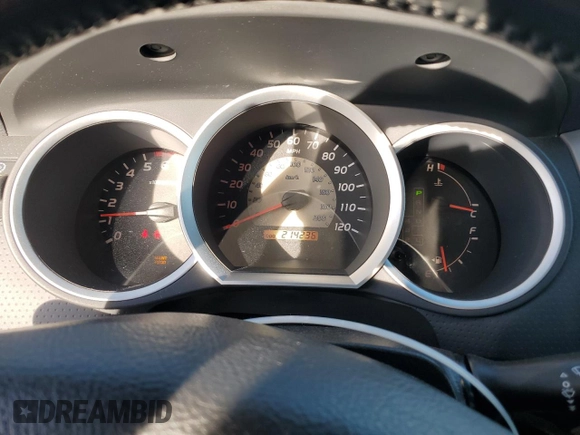 2011 Toyota Tacoma PreRunner with VIN 3TMJU4GN7BM114871, listed as a Copart auction lot 87256214 with 214,236 mi miles and Salvage Title. Bid and sale history available at DreamBid. Image 9.