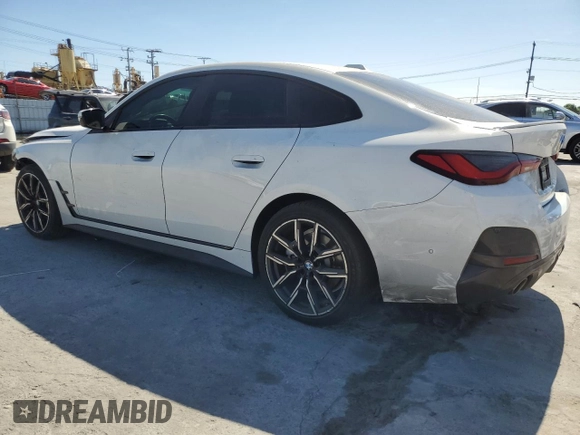 2022 BMW 4 Series 430i with VIN WBA63AV09NFM36850, listed as a Copart auction lot 49596085 with 51,405 mi miles and Salvage title. Bid and sale history available at DreamBid. Image 2.