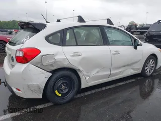 2014 Subaru Impreza Premium z VIN JF1GPAC68E8310797, wystawiony jako IAAI lot #42258193 z przebiegiem 104 260 mil mil oraz . Historia ofert i sprzedaży dostępna na DreamBid. Obrazek 6.