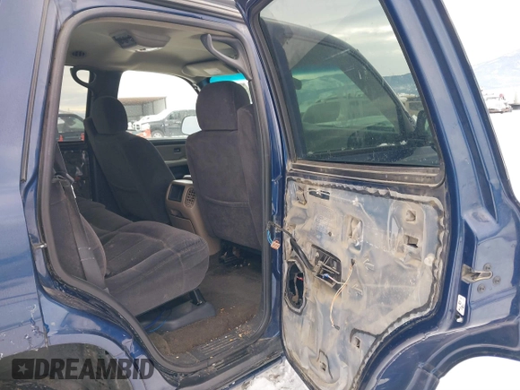 2002 Chevrolet Tahoe LS with VIN 1GNEK13V12J330179, listed as a IAAI auction lot 41382530 with 216,051 mi miles and . Bid and sale history available at DreamBid. Image 8.