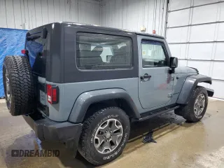 2014 Jeep Wrangler Sport with VIN 1C4AJWAG9EL322982, listed as a Copart auction lot 51145075 with 122,686 mi miles and Salvage Title. Bid and sale history available at DreamBid. Image 3.