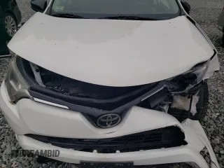 2018 Toyota RAV4 LE with VIN 2T3BFREV3JW764258, listed as a Copart auction lot 61234155 with Not provided miles and Salvage title. Bid and sale history available at DreamBid. Image 12.