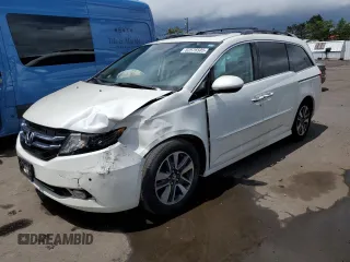 2015 Honda Odyssey Touring Elite with VIN 5FNRL5H90FB025019, listed as a Copart auction lot 62576505 with 110,290 mi miles and Salvage title. Bid and sale history available at DreamBid. Image 1.