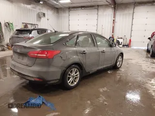 2015 Ford Focus SE with VIN 1FADP3F2XFL342480, listed as a IAAI auction lot 41607487 with 103,530 mi miles. Bid and sale history available at carsss.com. Image 4.