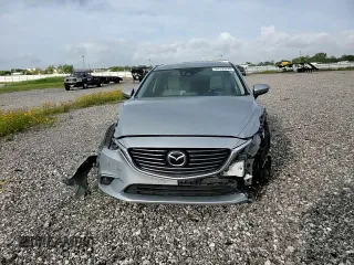 2016 Mazda 6 i Grand Touring с VIN JM1GJ1W53G1434499, выставлен на аукционе Copart как лот 54739745 с пробегом Не указан миль и Списание • Salvage title. История ставок и продаж доступна на DreamBid. Изображение 13.