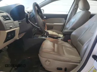 2010 Ford Fusion Hybrid with VIN 3FADP0L31AR298584, listed as a Copart auction lot 50825685 with 166,642 mi miles and Salvage Title. Bid and sale history available at DreamBid. Image 7.