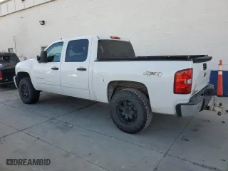 2011 Chevrolet Silverado 1500 LS with VIN 3GCPKREAXBG404727, listed as a Copart auction lot 86861374 with 153,928 mi miles and Salvage Title. Bid and sale history available at carsss.com. Image 2.